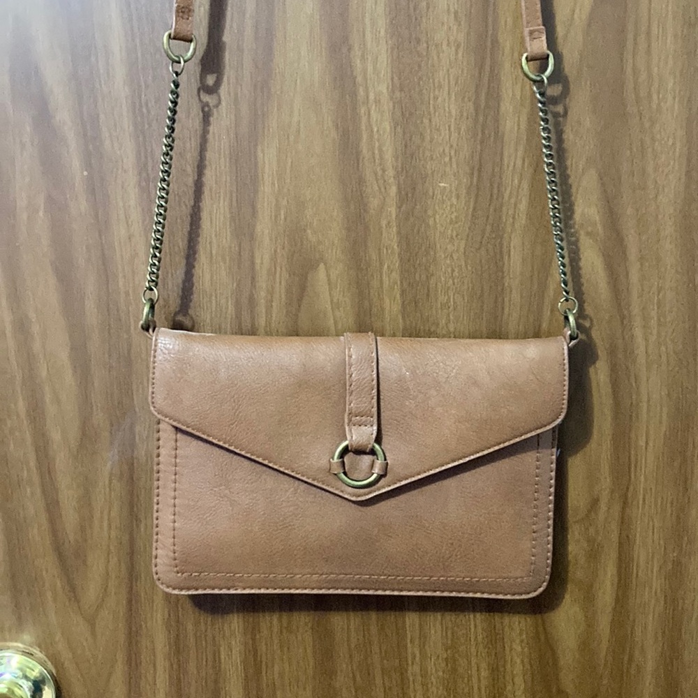 Brown long strap purse.